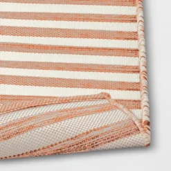 7'x10' Narrow Wornstripe Rectangular Woven Outdoor Area Rug Coral Orange - Threshold™ 7 7'x10' Narrow Wornstripe Rectangular Woven Outdoor Area Rug Coral Orange - Threshold™ -Threshold GUEST 25e56bbe db53 43e9 807e 1d35d9996e1a