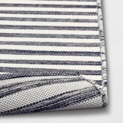 7'x10' Narrow Wornstripe Rectangular Woven Outdoor Area Rug Navy Blue - Threshold™ -Threshold GUEST 899b548d f416 4892 bc7a 3d8cdcf92d5b