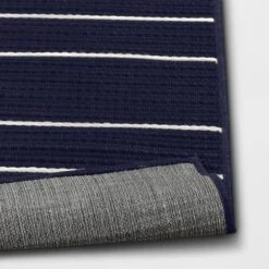 7'x10' Thin Stripe Rectangular Woven Outdoor Area Rug Navy/Ivory - Threshold™ 7 7'x10' Thin Stripe Rectangular Woven Outdoor Area Rug Navy/Ivory - Threshold™ -Threshold GUEST d8dd5e92 4349 401f 907f d39c6645ef8e