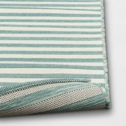 5'x7' Narrow Wornstripe Rectangular Woven Outdoor Area Rug Turquoise Blue - Threshold™ -Threshold GUEST de24221f eb98 4b3d 8215 da45667ce98e