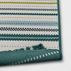 5'x7' Textural Stripe Rectangular Woven Outdoor Area Rug Light Green - Threshold™ 7 5'x7' Textural Stripe Rectangular Woven Outdoor Area Rug Light Green - Threshold™ -Threshold GUEST f007cad1 6d19 4860 a2d7 527203ce29f5